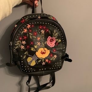 Embroidered vegan leather backpack